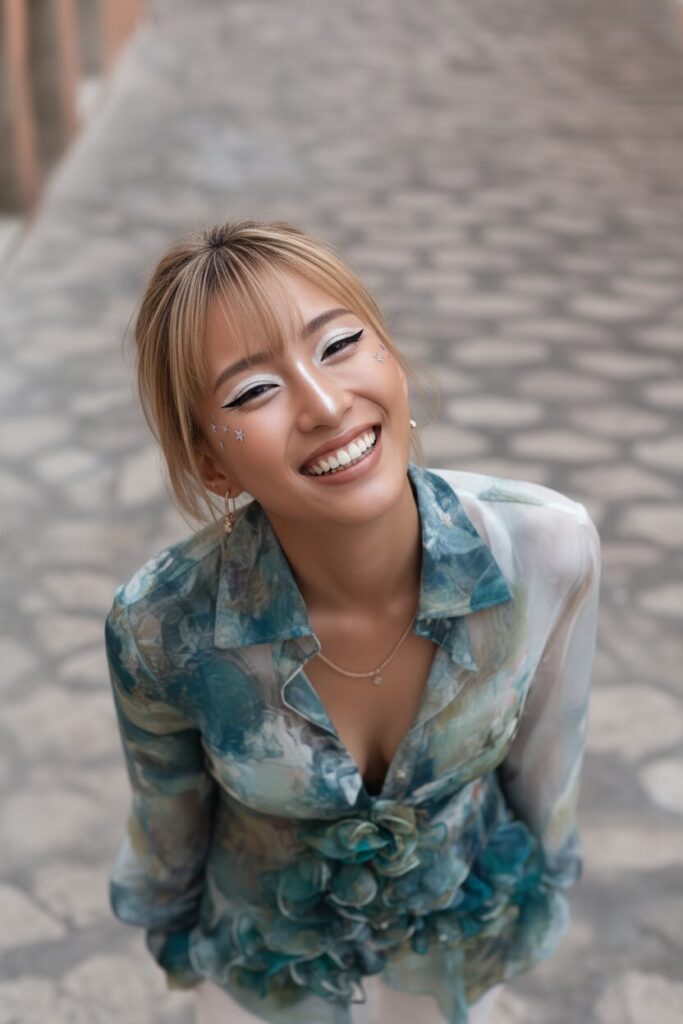 A woman with ganguro gyaru makeup.